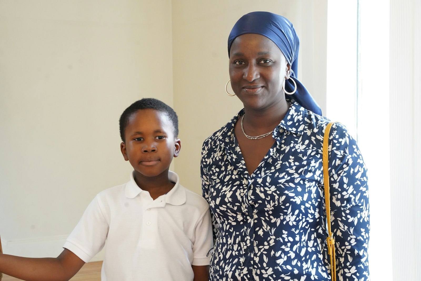 Coura Ndiaye from Senegal and her 7-year old son, Magib Diaw, are one of two families currently living at Bakhita House, a temporary home for immigrants, refugees and asylum-seekers at Christ the King Parish in Detroit.
