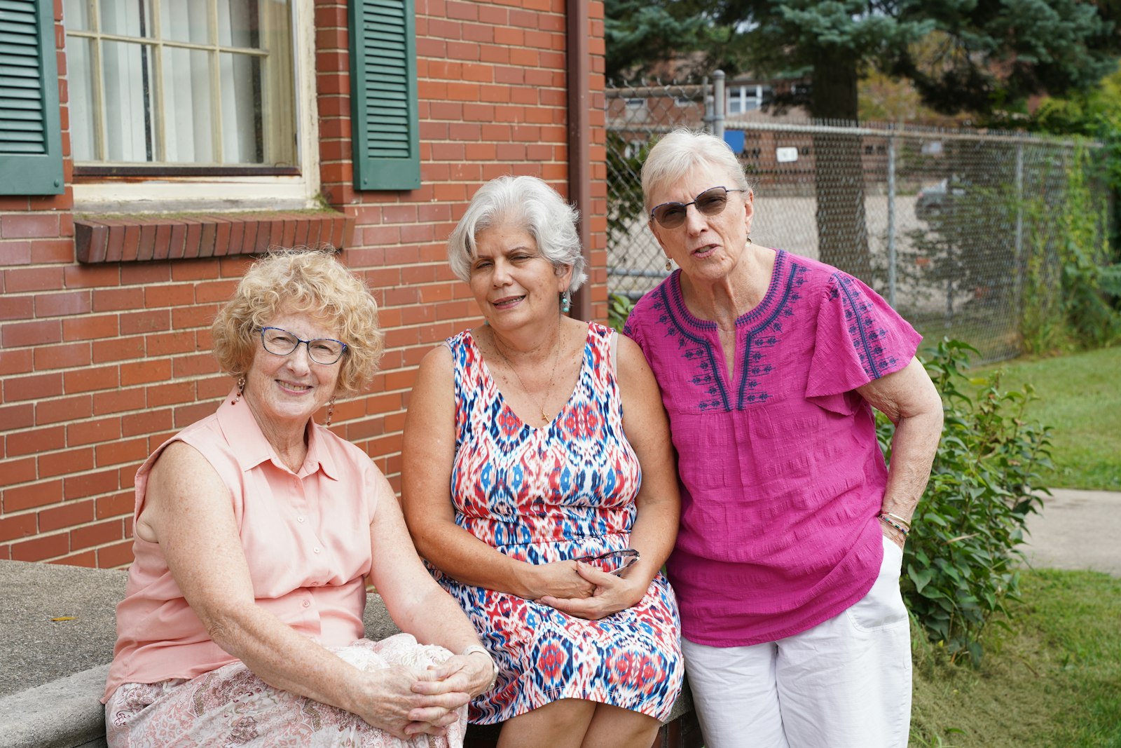 Linda Tomala, Jean Krystyniak and Karen Seefelt are the three "grandmothers" of Bakhita House, the go-to volunteers who look out for the needs of the house's residents.