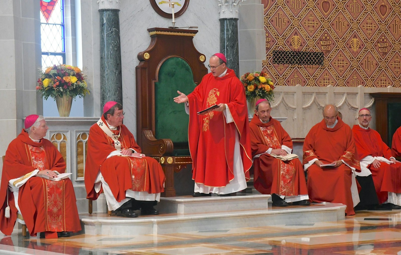 Bishop Lohse addresses the faithful and his brother bishops in his remarks of gratitude after being ordained and installed as the fifth bishop of Kalamazoo. Bishop Lohse, 61, succeeds Bishop Paul J. Bradley, 77, left, who has served the diocese since 2009. (John Grap | Diocese of Kalamazoo)