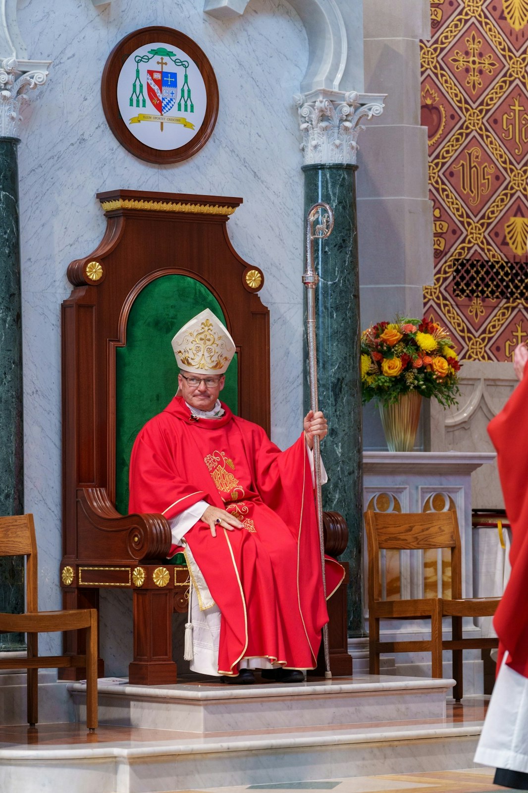 Bishop Edward M. Lohse takes his cathedra for the first time as bishop of the Diocese of Kalamazoo. A priest of the Diocese of Erie, Pa., Bishop Lohse said he hopes to take inspiration from the martyrs of the Church as he leads the faithful in professing Jesus Christ as Lord. (Vince Dragone | Diocese of Erie)