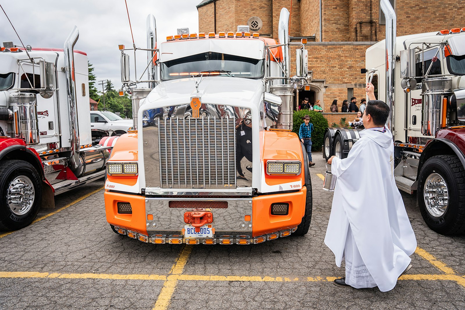 As the rigs leave the parking lot, each driver honks a horn in gratitude, a tradition Fr. Espinoza said he loves.