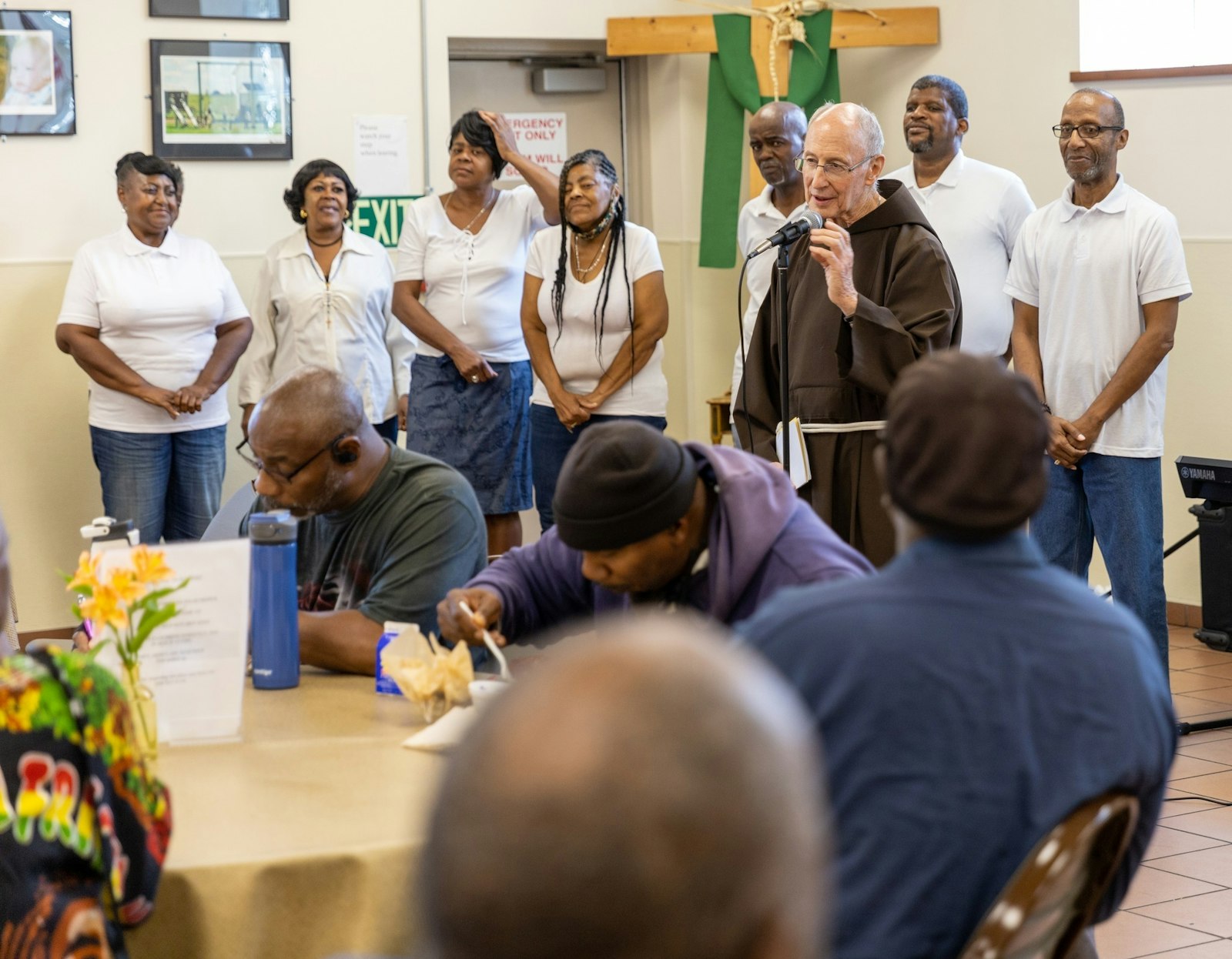 Bro. Malloy addresses volunteers, guests and fellow friars during his retirement gathering Sept. 16. Over the past two decades, Bro. Malloy has been the most recognizable face of one the Capuchins' most visible ministries to the poor and marginalized, offering a friendly smile, warm meal and a listening ear to those who frequent the soup kitchen.