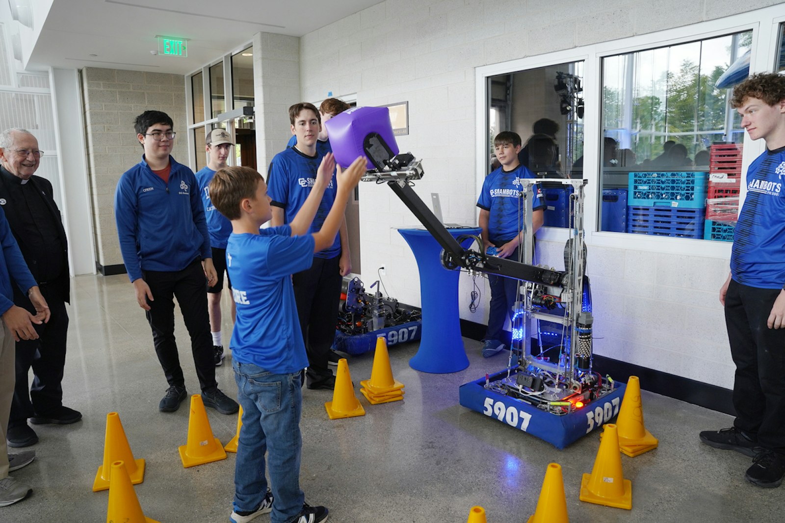 Catholic Central students test out some of the robotics equipment available in the new George and Mary Turek Hall of Science, a 57,000-square-foot building with eight science labs, an engineering lab, a full-sized robotics competition field and an adjacent machine shop that donors and school leaders say will be the envy of every high school, and most colleges, in Michigan.