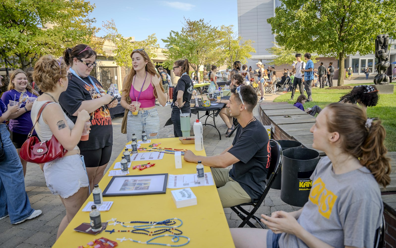 The campus ministry team talks to students during the involvement fair at the College for Creative Studies, inviting them to join events such as Bible studies and small groups to foster a sense of faith-based community on campus.