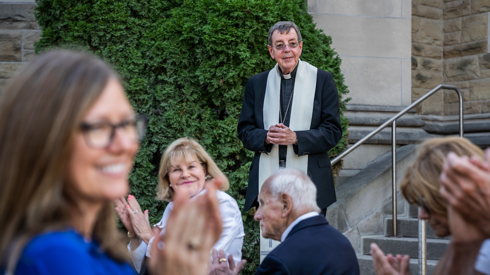 Archbishop Vigneron smiles during a blessing of a new grotto dedicated to Our Lady of Lourdes at the Cathedral of the Most Blessed Sacrament on Oct. 3, 2023. At the start of the COVID-19 pandemic, the archbishop pledged to build a grotto "as a lasting token of our gratitude" for the Blessed Virgin Mary's protection and a "perpetual reminder" of her care for the Archdiocese of Detroit. (Valaurian Waller | Detroit Catholic)