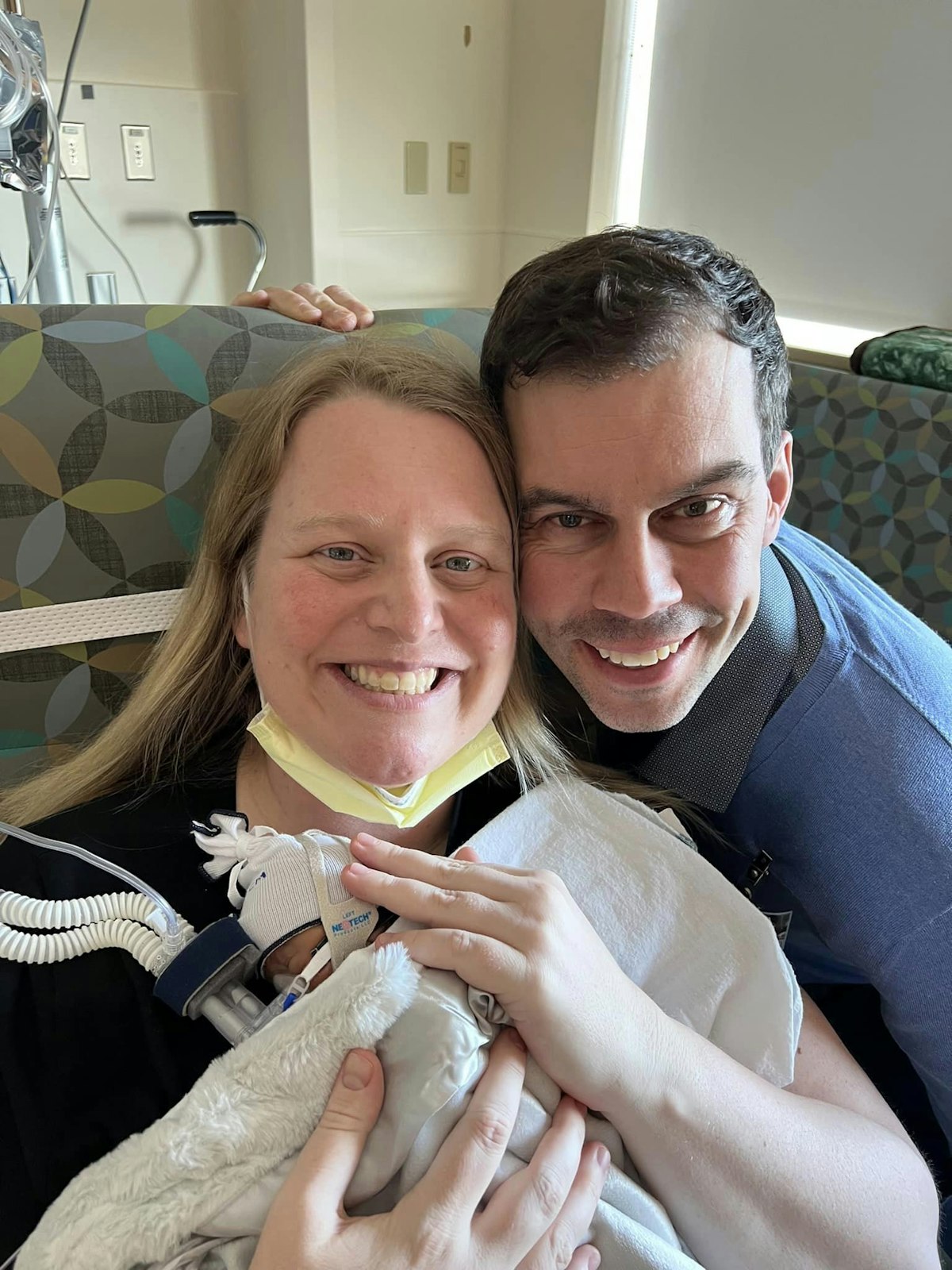 Katy and Brad Conners hold baby Teddy a few days after he was born Jan. 27. Katy Conners underwent successful heart valve surgery on March 8.