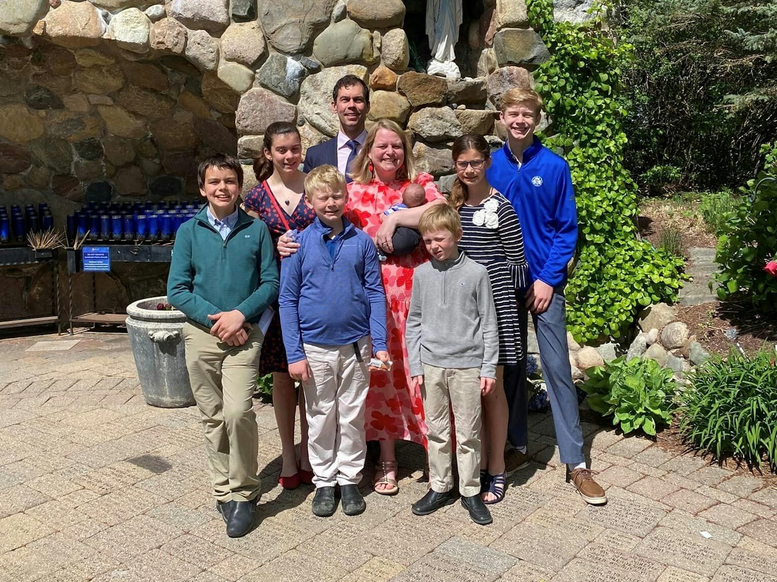 The Conners family poses for a photo after Mass on Mother's Day, May 14, at Our Lady of Good Counsel Parish in Plymouth, the first Mass for baby Teddy, who was born Jan. 27 weighing just 2 pounds, 1 ounce. Teddy came home from the hospital May 8.