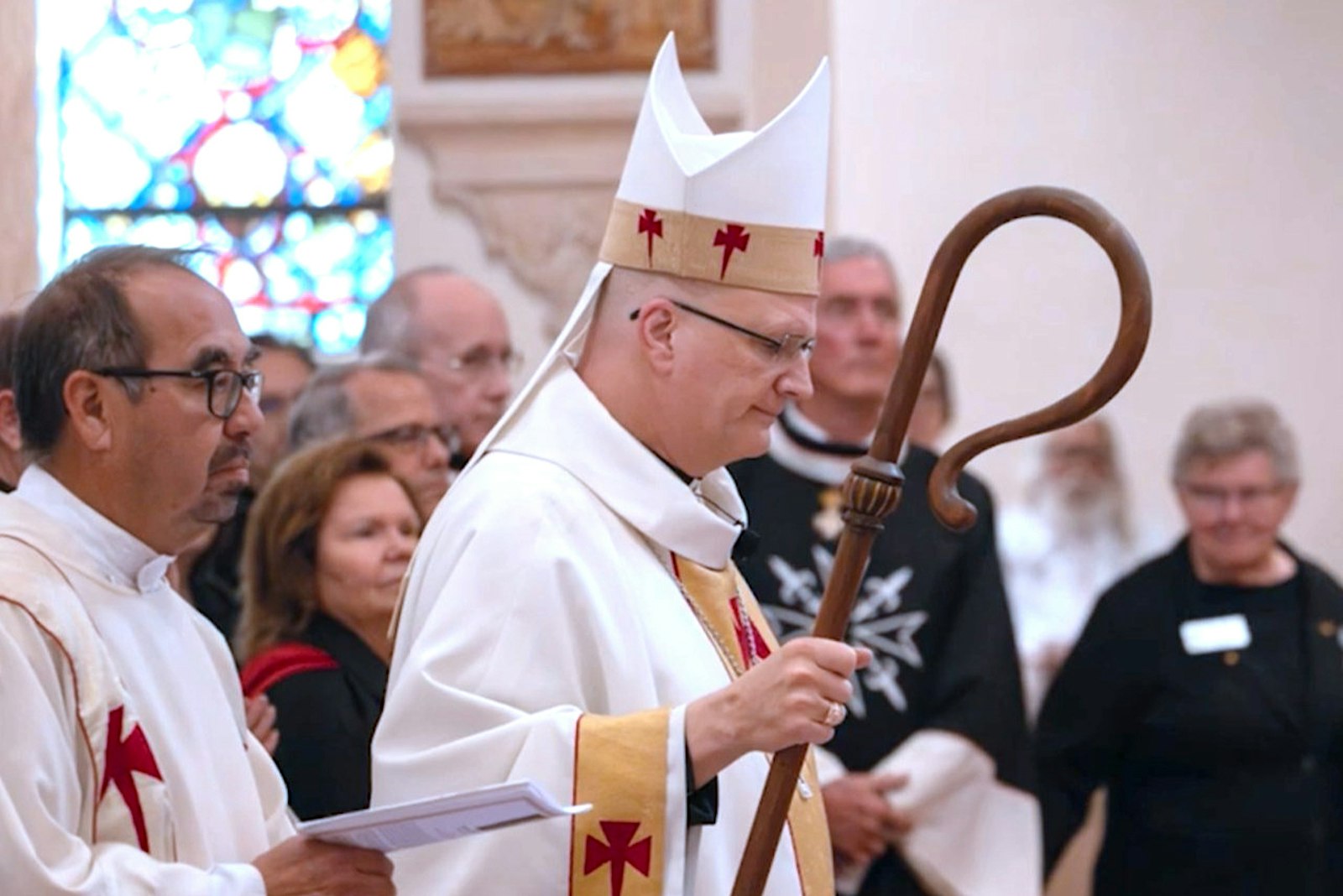 Archbishop-designate Edward J. Weisenburger carries his crosier in procession during his farewell Mass in the Diocese of Tucson on March 2. (Courtesy of the Diocese of Tucson)