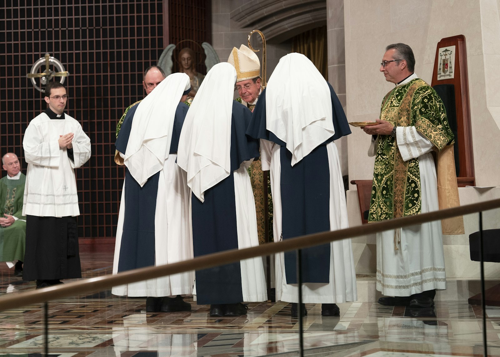 Members of the Sisters of Life, a religious community dedicated to the protection of life, present the gifts to Archbishop Vigneron on Oct. 1 during the archdiocese’s annual Mass for Life at the Cathedral of the Most Blessed Sacrament.