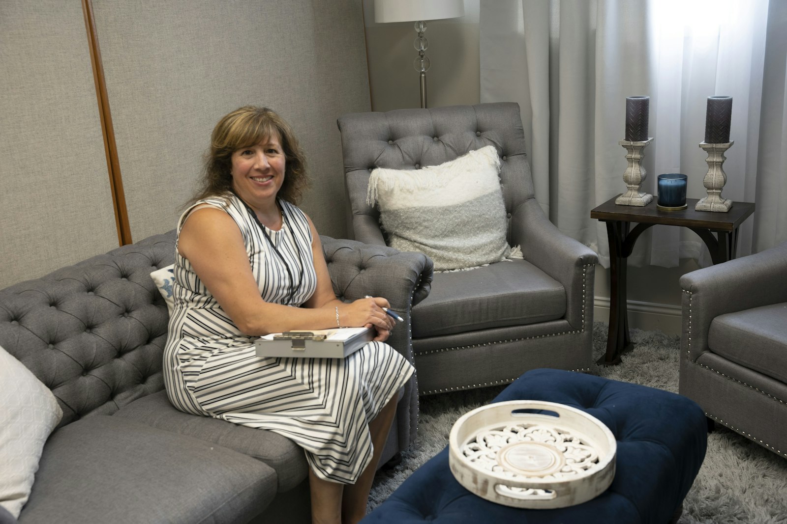 Andrea Griggs is pictured in the consultation room at the Planned Choices pregnancy center in Allen Park. The U.S. Conference of Catholic Bishops' "Walking With Moms in Need" initiative aims to make mothers aware of the network of ministries and resources available by informing parishes and making it easier to locate services.