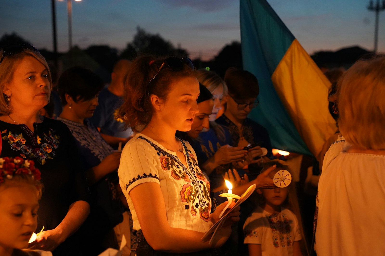 Ukrainians and Ukrainian-Americans pray Aug. 23 during a candlelight vigil at St. Josaphat Ukrainian Catholic Church in Warren.