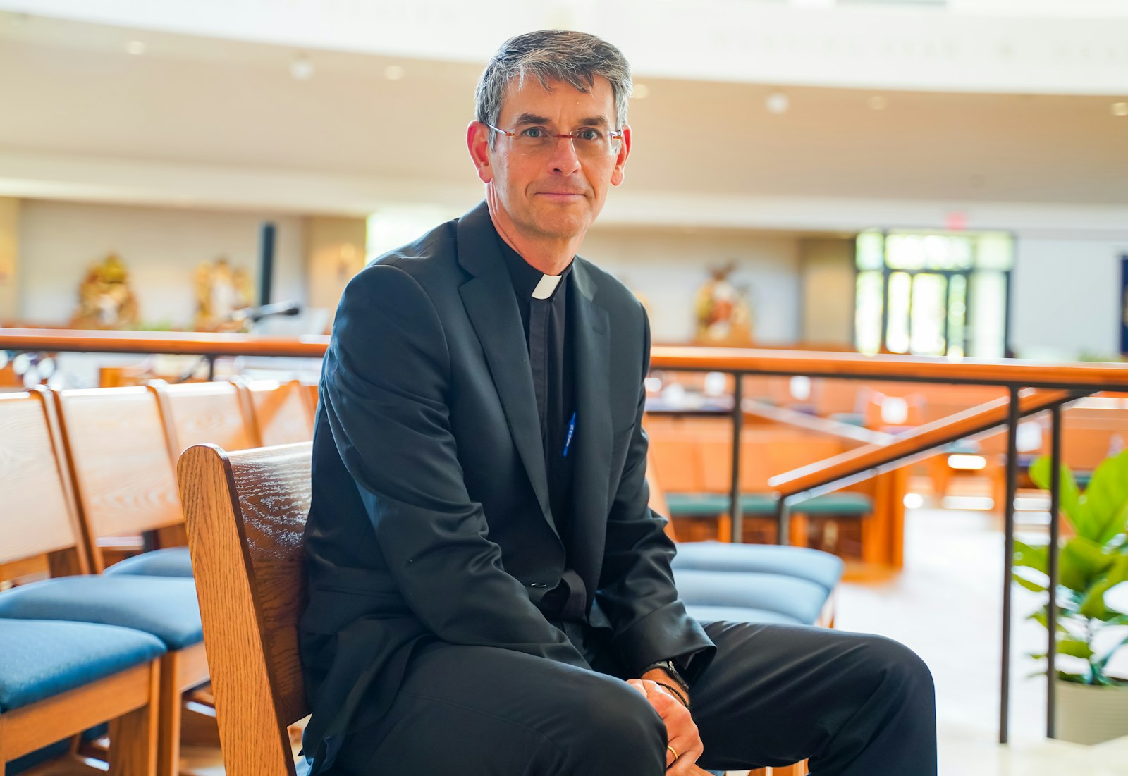 Fr. John Riccardo, founder of the ACTS XXIX apostolate and former pastor of Our Lady of Good Counsel Parish in Plymouth, joined Michigan head football coach Jim Harbaugh as one of two keynote speakers during the July 17 Plymouth Right to Life dinner and auction. (Valaurian Waller | Detroit Catholic)