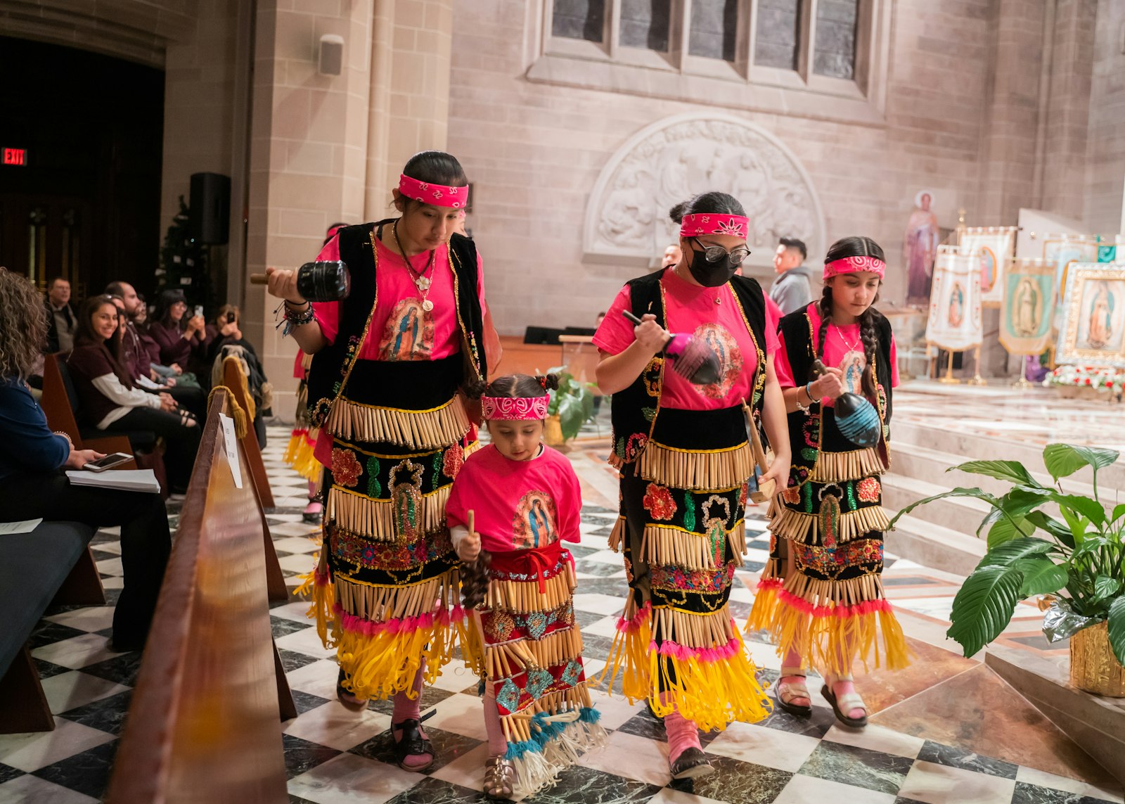 The connection between dance and spirituality echoes the history of the natives' conversion to Catholicism. Thus, dance becomes a cultural bridge that links the indigenous past with the Catholic faith.