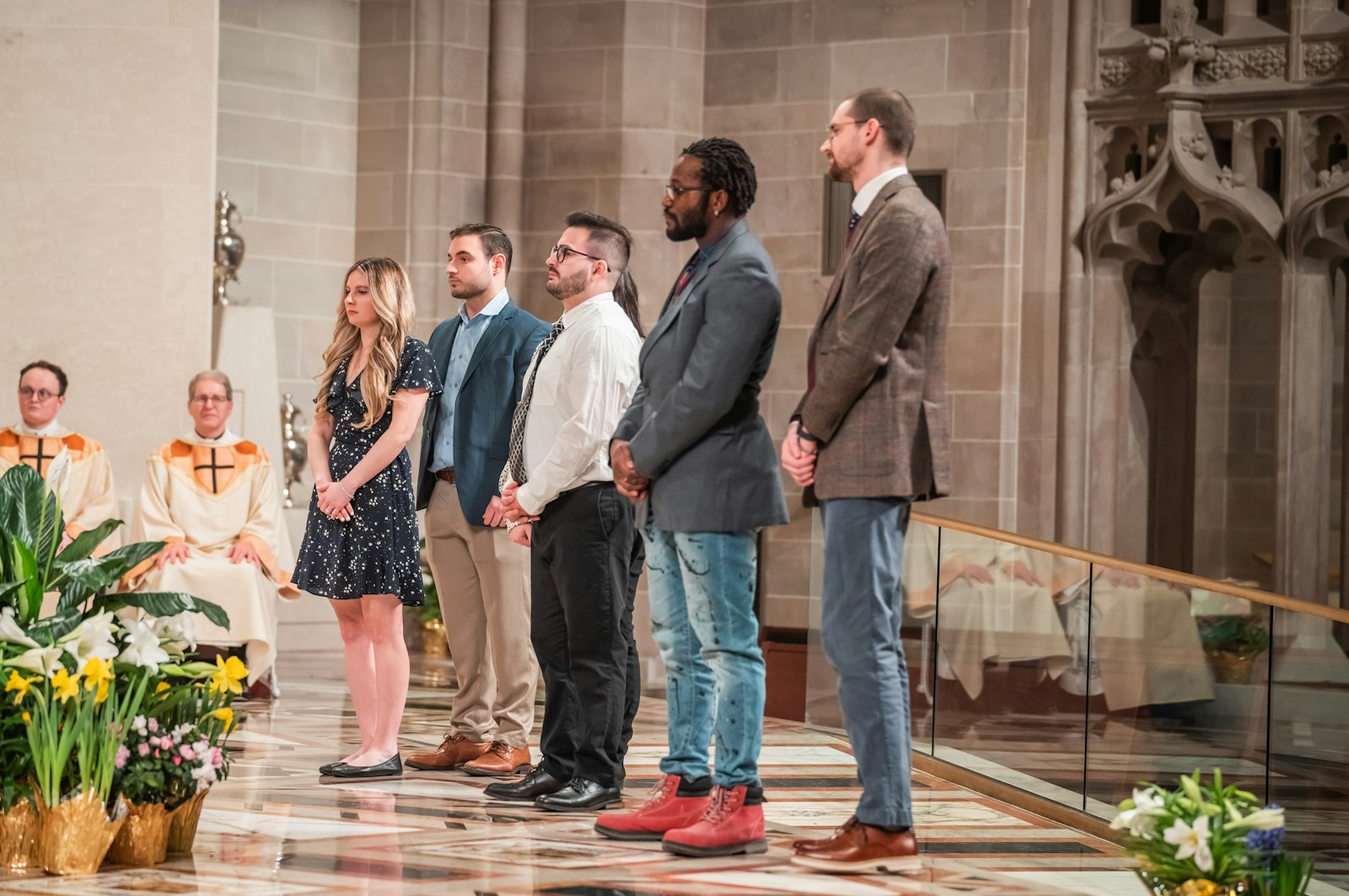 Candidate Anthony Nellon, second from right, said he was inspired to begin studying the teachings of the Church after Pope Francis became pope in 2013.