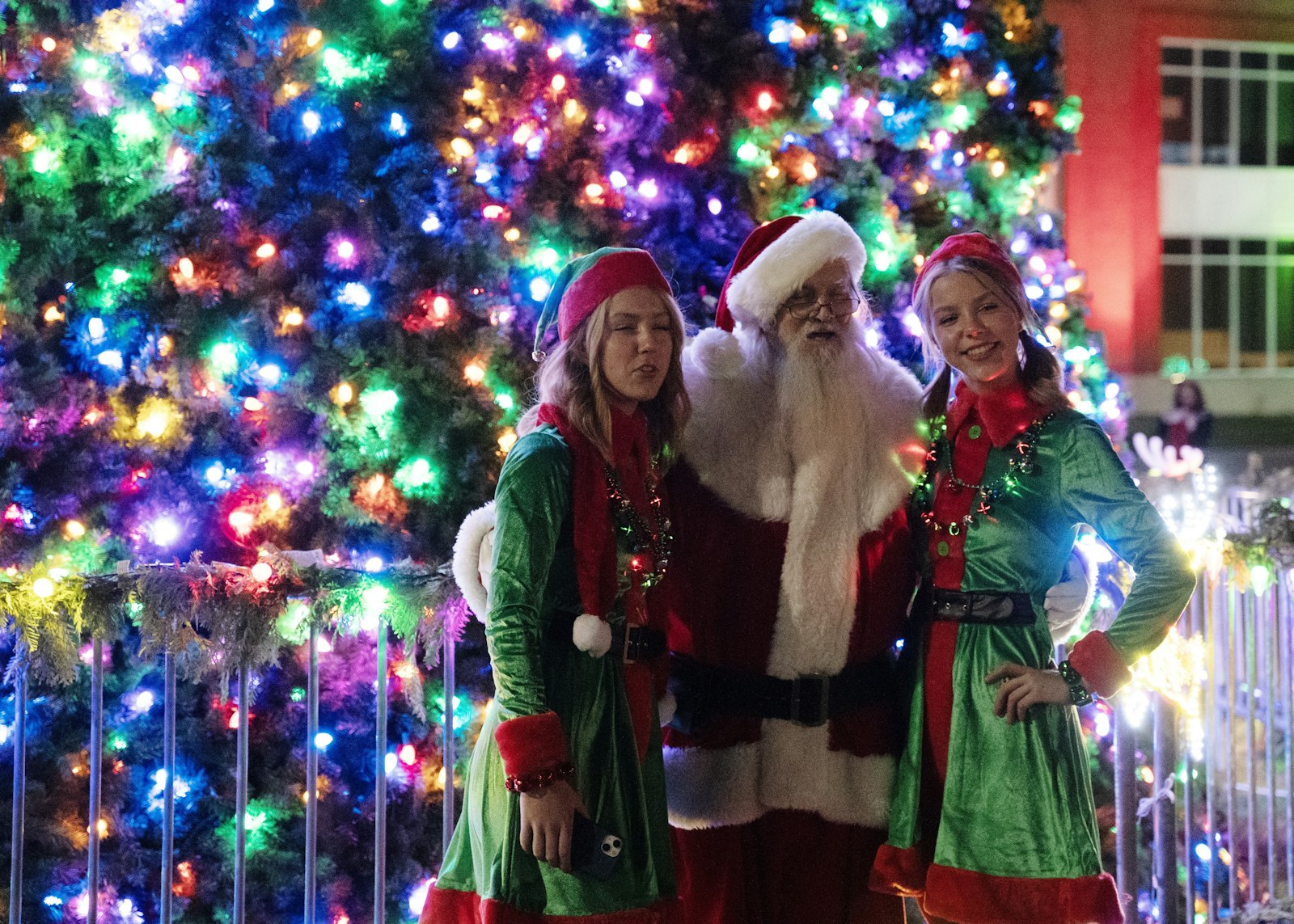 Amelia and Miriam Czarnik, juniors and twin sisters at St. Mary's Preparatory, served as Santa's elves during the "Mingle All the Way" event. (Gabriella Patti | Detroit Catholic)