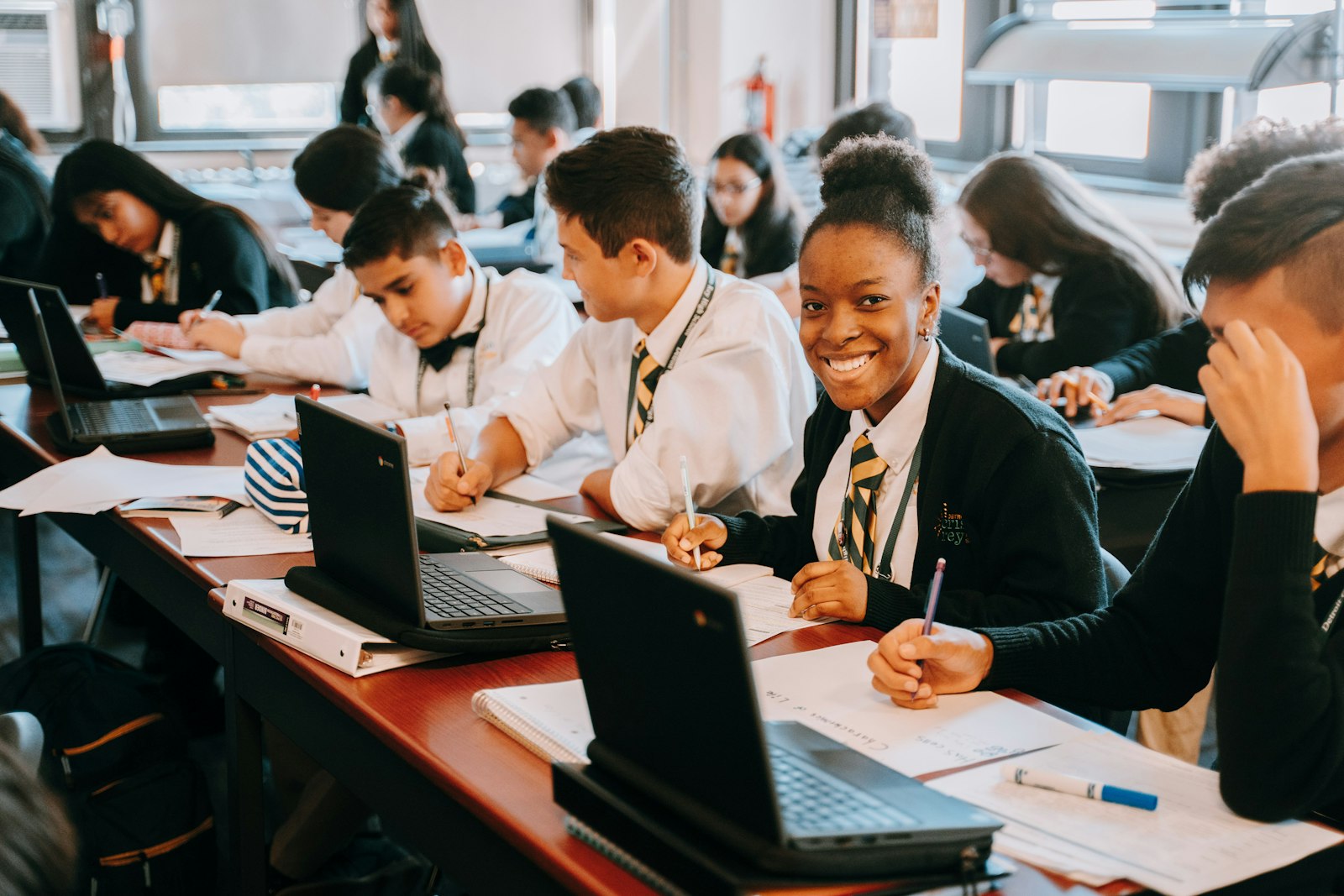 Detroit Cristo Rey High School students work on laptops in October. Local Catholic schools saw a 7 percent enrollment increase last year, and have held steady this academic year.