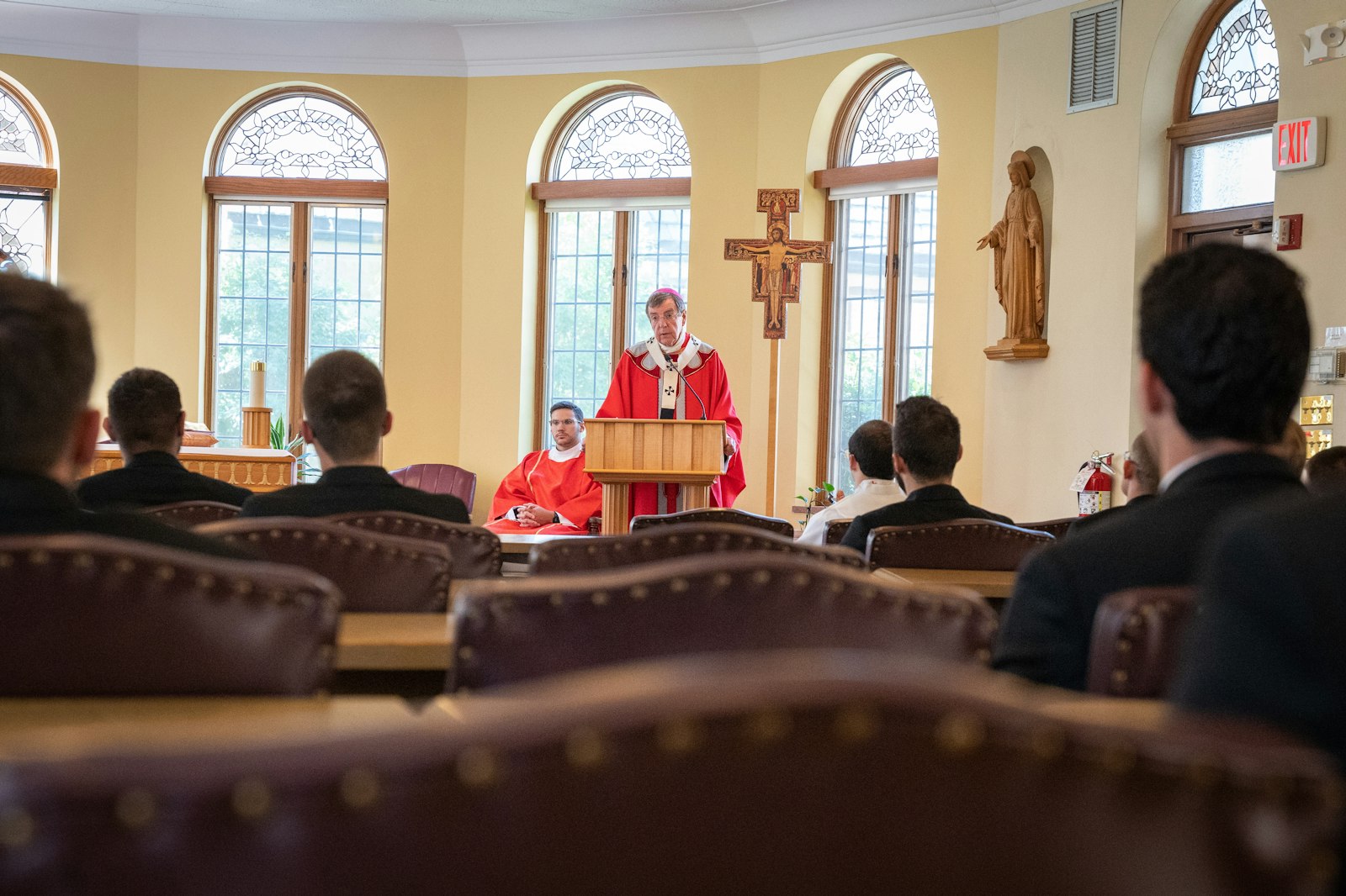 Detroit Archbishop Allen H. Vigneron preaches a homily during the Mass of Candidacy for four Detroit seminarians Aug. 10 at Manresa Jesuit Retreat House in Bloomfield Hills. The men, who will begin theology studies at Sacred Heart Major Seminary this fall, are now entering a more "public phase" of their discernment.