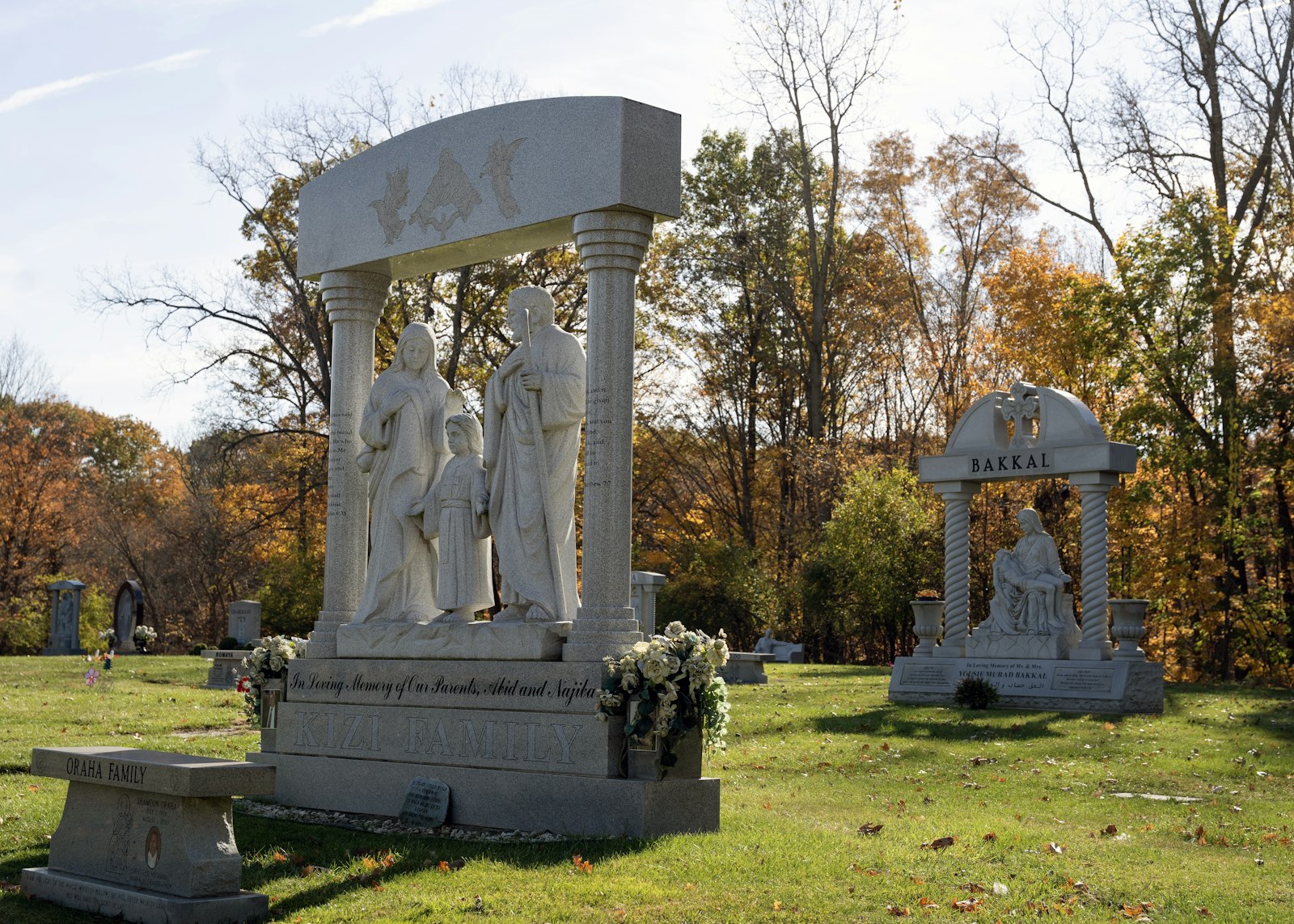 Memorials depicting the Holy Family and a representation of Michaelangelo's Pieta, the famous sculpture of Mary holding Jesus' body after he was brought down from the Cross, are among the markers at Holy Sepulchre Cemetery.