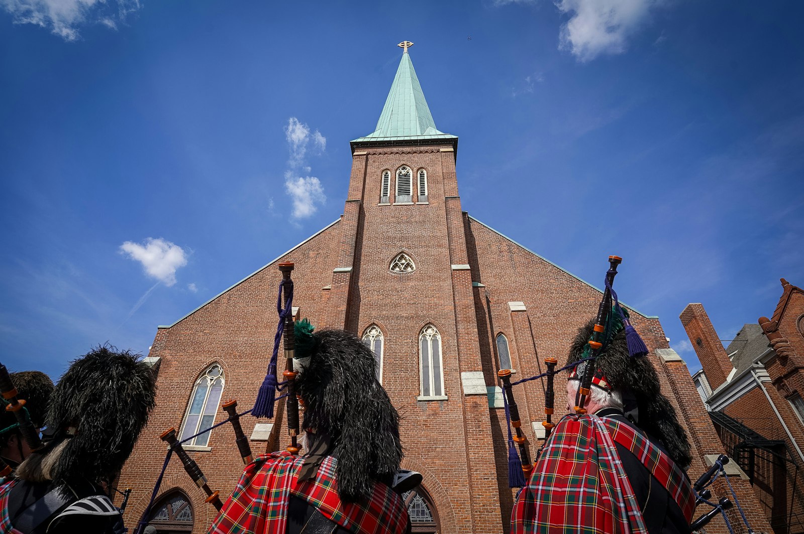 Bagpipers play in front of the historic church next to the Lodge Freeway near downtown Detroit. Since 1834, the parish has served as the spiritual hub of St. Patrick's Day celebrations in the city, drawing dignitaries and Catholics from across the state.