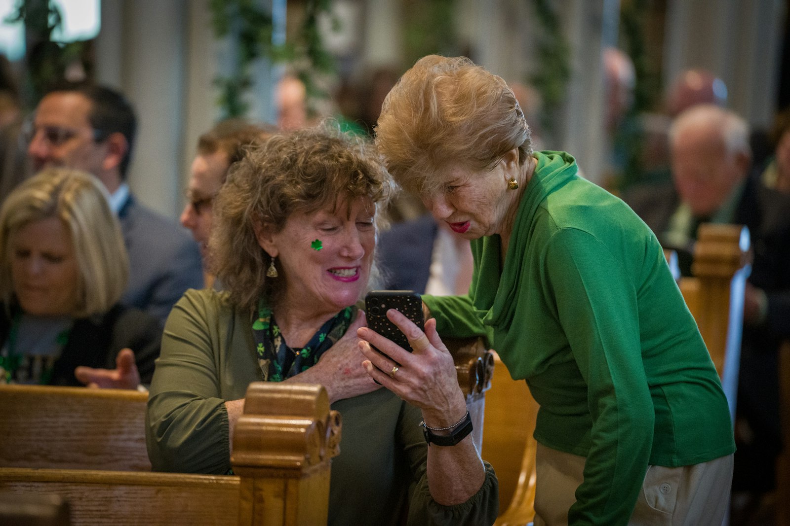 Congregants, decked out in green, fill the pews at Most Holy Trinity Parish on March 17. After two years of subdues celebrations because of the COVID-19 pandemic, this year's celebration featured most of the usual trappings of St. Patrick's Day at the historic Corktown parish.