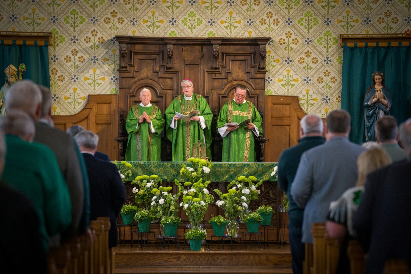 Auxiliary Bishop Gerard W. Battersby, whose ancestors hail from Belfast, Ireland, presides over the St. Patrick's Day Mass at Most Holy Trinity. The conversion of the Irish had a significant impact on the conversion of the rest of the world, Bishop Battersby said, as they emigrated to all corners of the globe, bringing the Gospel with them.