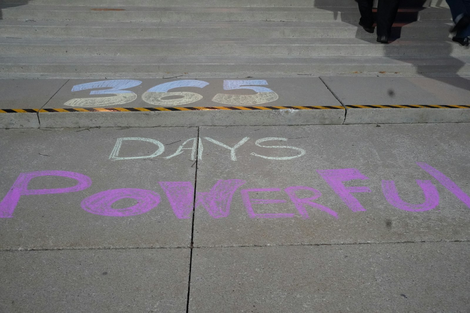 The path leading up to St. Mary the Protectress Ukrainian Orthodox Cathedral was decorated with chalk messages commemorating the last 365 days of oppression, war, and perseverance the Ukrainian people have had to endure. (Daniel Meloy | Detroit Catholic)