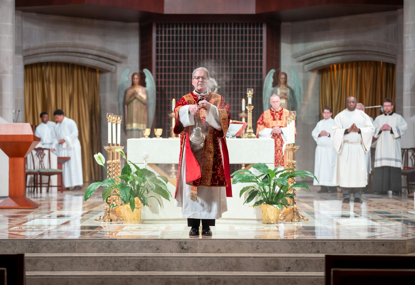 Deacon Mike Van Dyke incenses the congregation during the Pentecost Vigil at the Cathedral of the Most Blessed Sacrament on June 4.