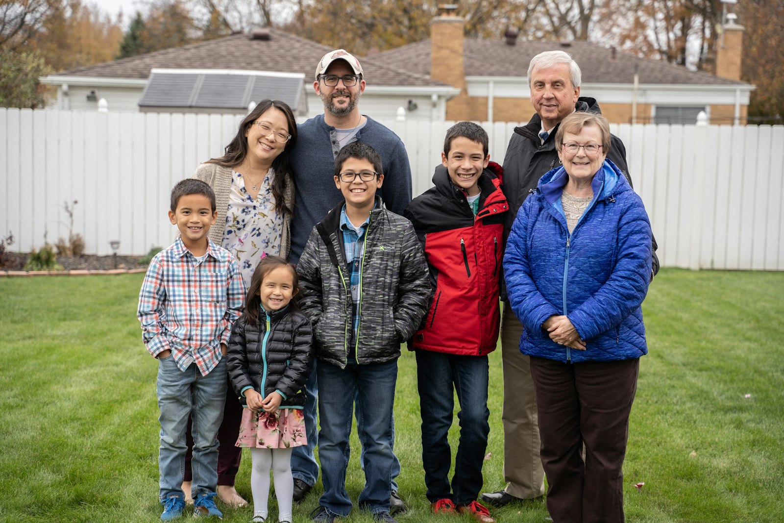 Nicole Joyce, left, is pictured with her family. As a mother, Joyce said she and and her co-host, Rakhi McCormick, hope the "Beyond Sunday" podcast can break down the "lofty expectations" of family life and help families discover how to live in the faith in ordinary circumstances. (Valaurian Waller | Detroit Catholic)