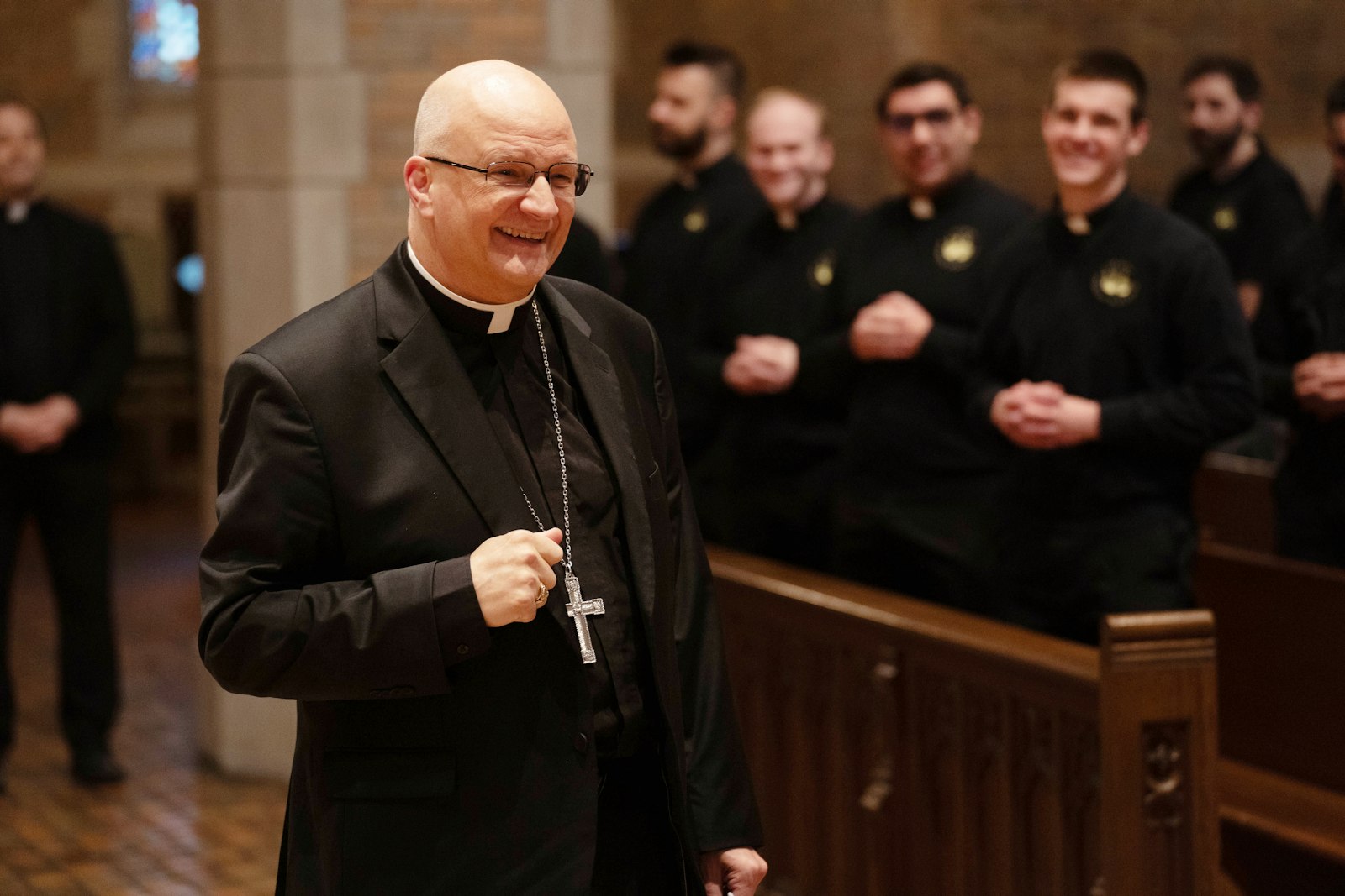 Archbishop-elect Edward J. Weisenburger greets seminarians in the chapel at Sacred Heart Major Seminary on Feb. 11. Early that morning, Pope Francis accepted the resignation of Archbishop Allen H. Vigneron and appointed Bishop Weisenburger of Tuscon, Arizona, as the sixth archbishop of Detroit. Archbishop-elect Weisenburger will be installed March 18.