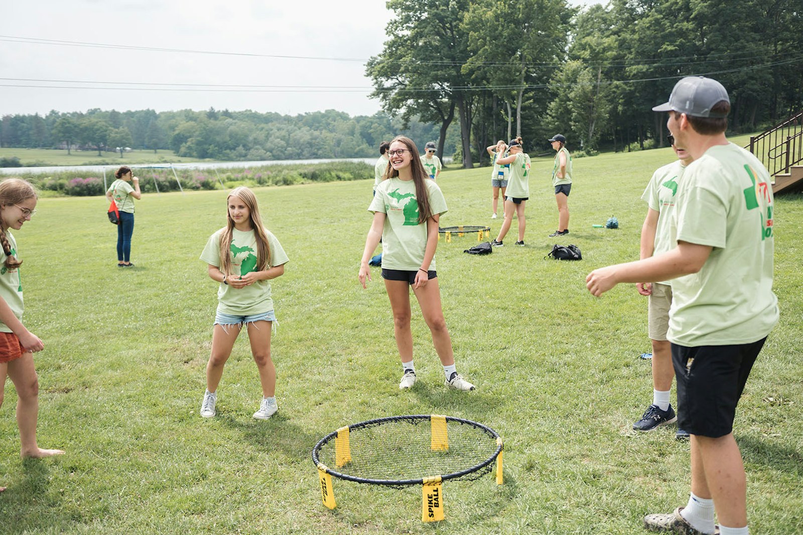 Young people take part in a game of Spikeball at Our Lady of the Fields Camp in Brighton during the World Youth Day "Home" event Aug. 5.