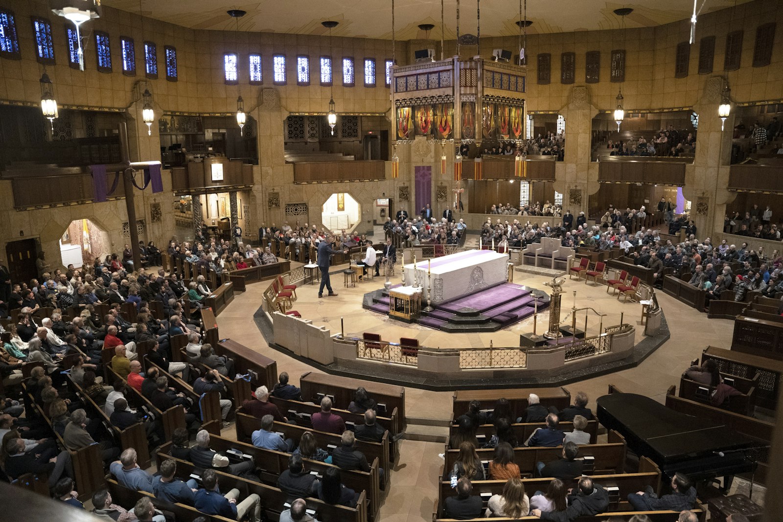 A capacity congregation listens to Harbaugh, McCormick and Fr. Riccardo talk about life, family and the centrality of faith.