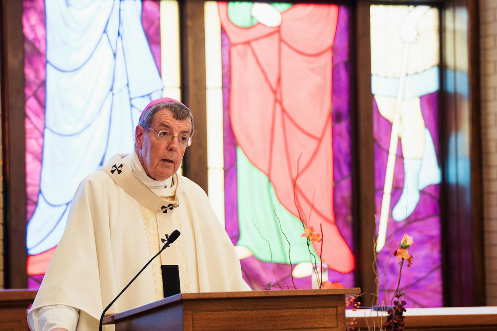 Just as young people everywhere are blessed by World Youth Day in Lisbon, pilgrims in Portugal are also blessed by the presence and celebration of pilgrims' World Youth Day "Home" event back home in Michigan, Archbishop Vigneron said during Mass at St. George Shrine at Our Lady of the Fields Camp in Brighton.