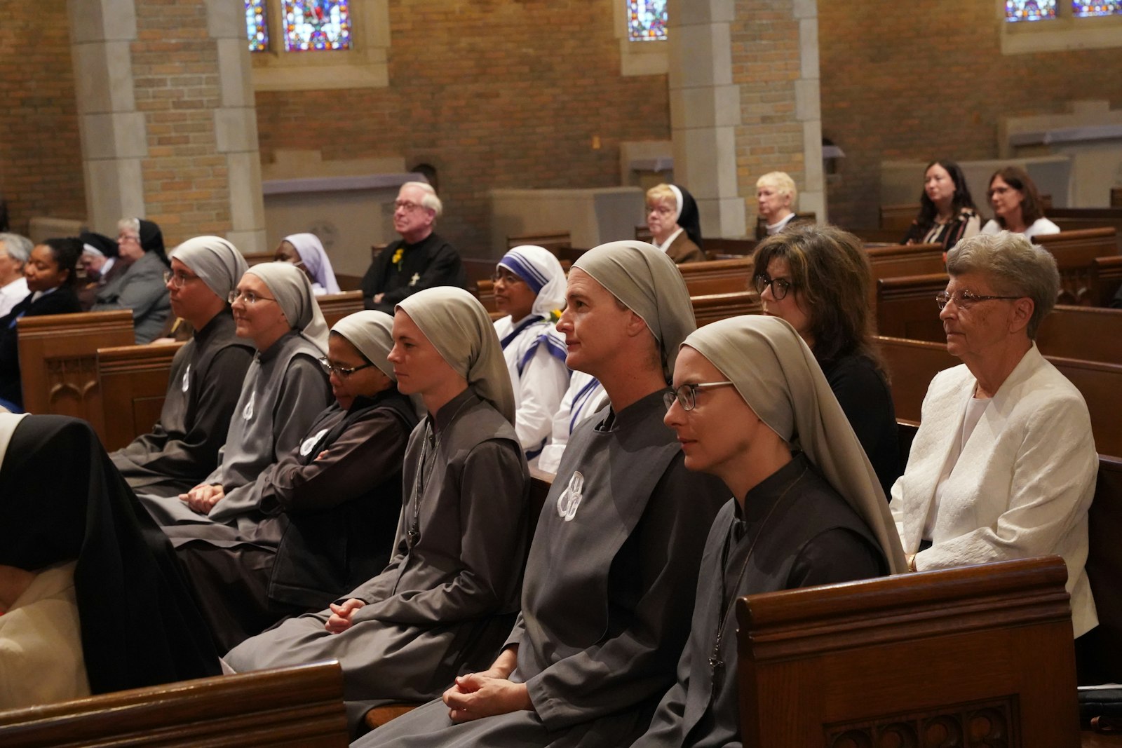 Members of the Society of the Our Lady of the Most Holy Trinity (SOLT) sit together during the 2023 Mass for consecrated life jubilarians at Sacred Heart Major Seminary in Detroit on Sept. 9. Archbishop Allen H. Vigneron said the Mass was a chance for professed religious men and women to reflect on all the graces, both public and private, they have received through their ministries.