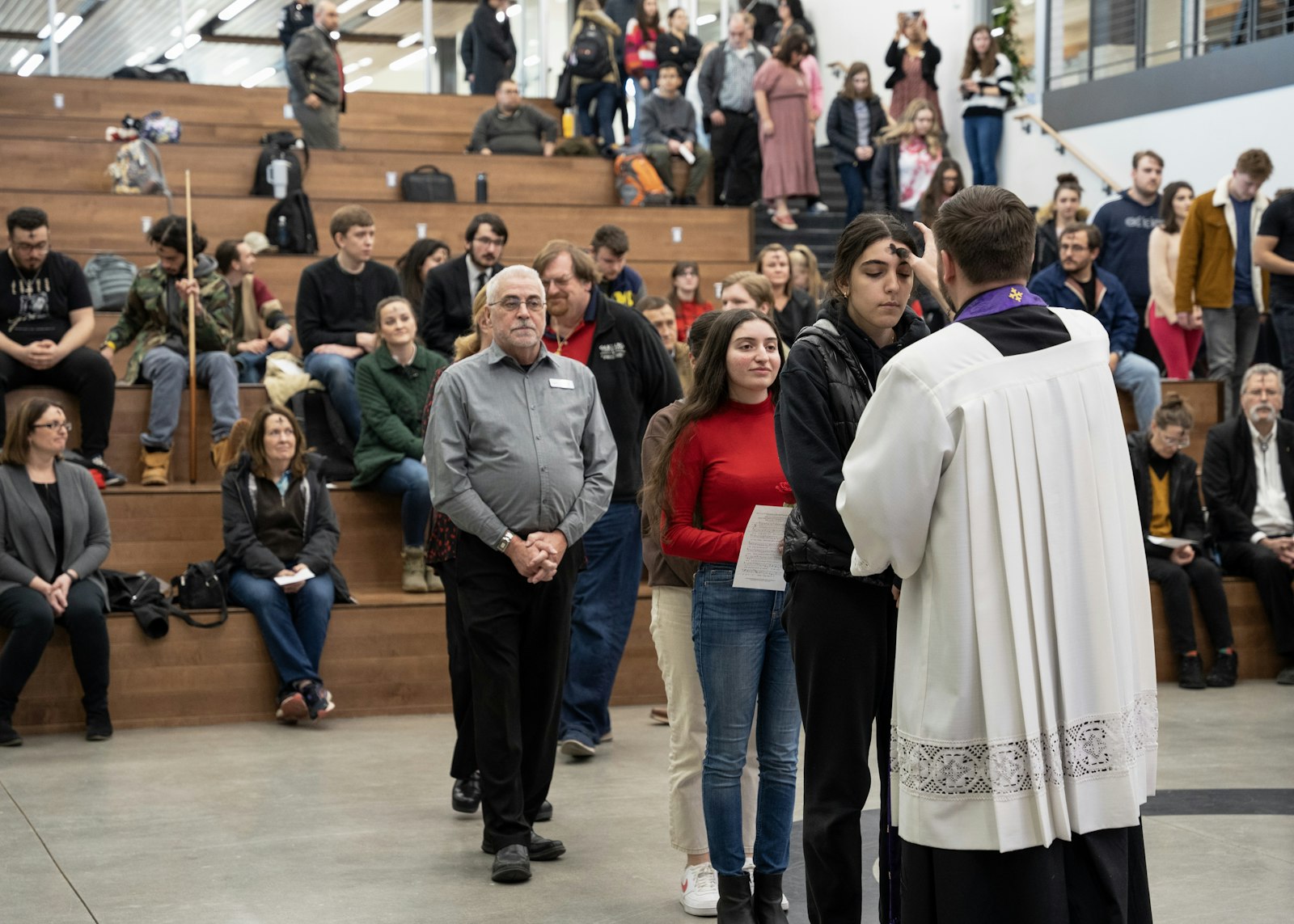 The Ash Wednesday event is typically held at the parish, which serves as the home base for the university’s Catholic campus ministry, but this year took place on the Oakland University campus itself.