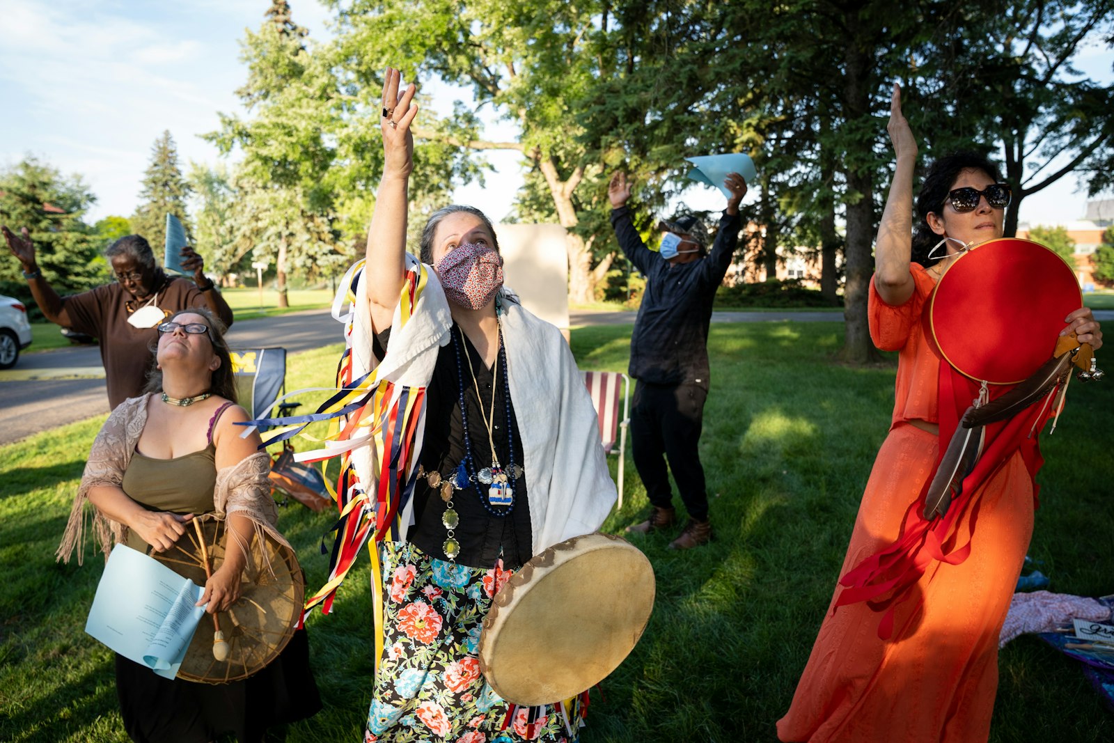 Members of the St. Kateri Tekakwitha Nicholas Black Elk Circle celebrate the summer solstice in June 2022 on the grounds of the Felician Sisters' motherhouse in Livonia. The circle, which currently has about 12 members, meets regularly to pray together and discover their common heritage and Catholic faith. (Valaurian Waller | Detroit Catholic)