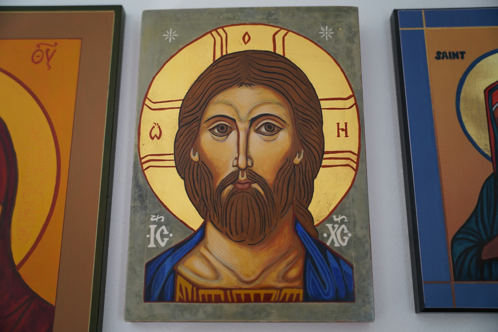 Christ is always depicted with a cruciform halo with the letters ICXC, the first and last letters of Jesus Christ in Greek.