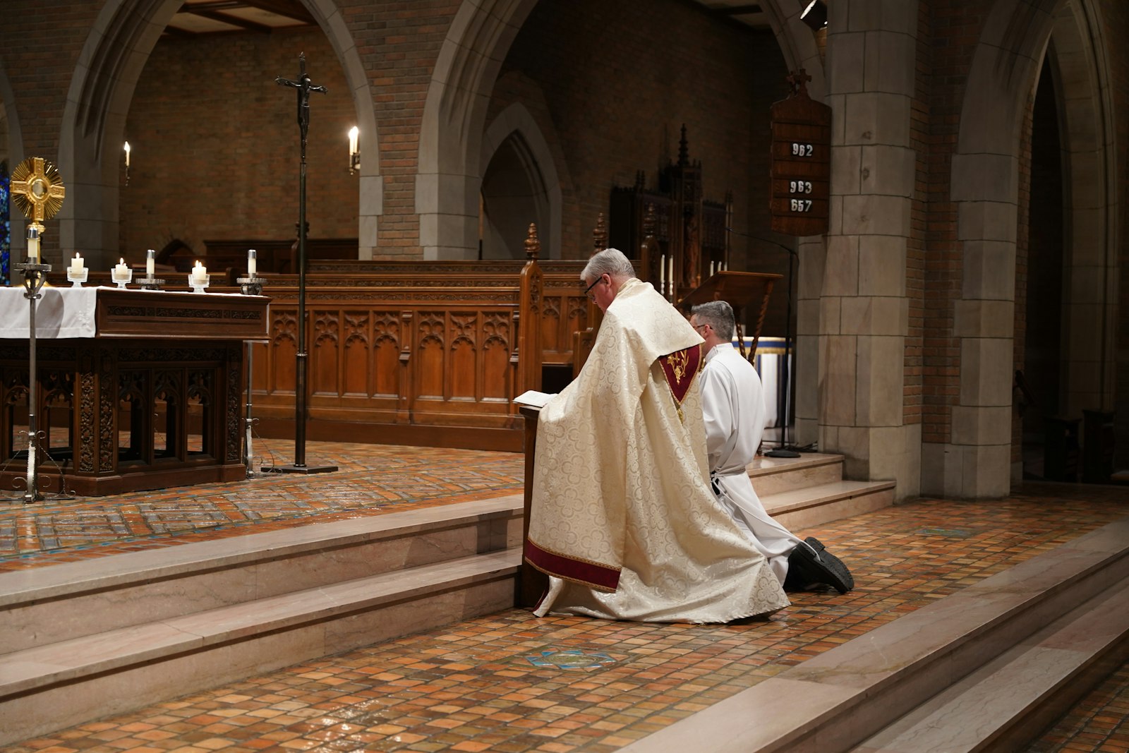 Auxiliary Bishop Gerard W. Battersby, who leads the Archdiocese of Detroit's participation in the Synod on Synodality, leads listening session participants in Eucharistic adoration in the chapel of Sacred Heart Major Seminary.