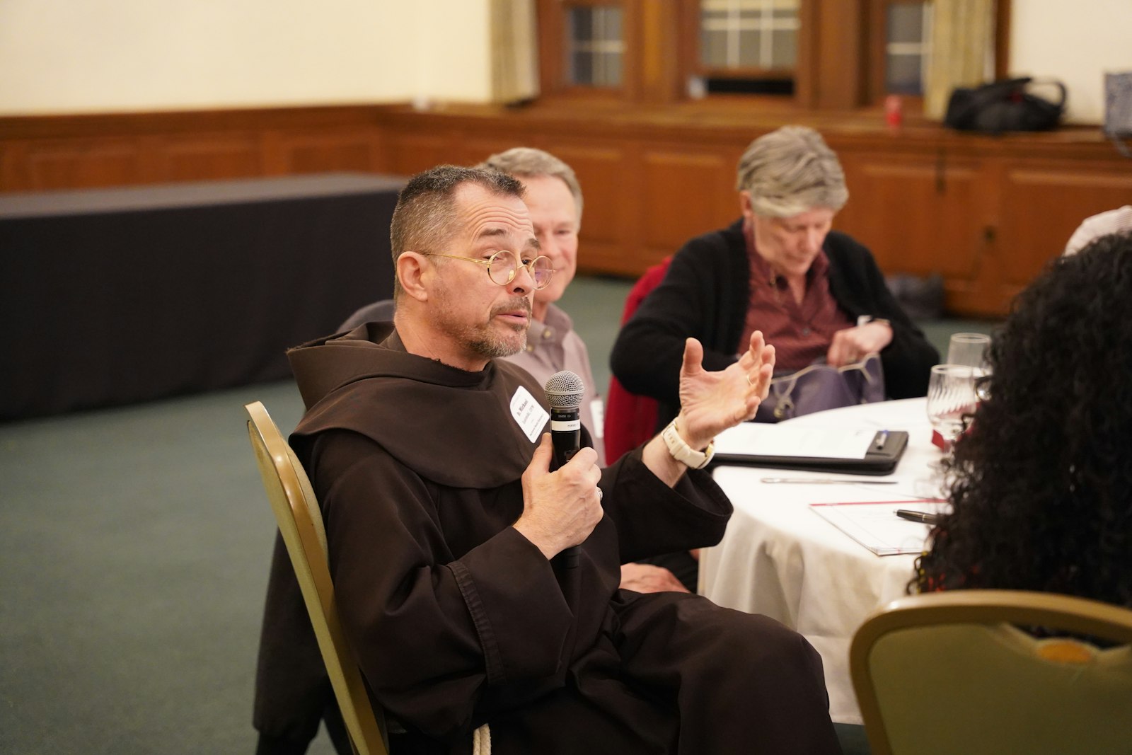 Bro. Michael Radomski, OFM, of the Duns Scotus Friary in Berkley, spoke from his Northwest Region table about how Archbishop Vigneron wrote in "Unleash the Gospel" that many priests live alone and are feeling isolated. Bro. Radomski noted how living in a religious community has spiritually fed him with camaraderie.