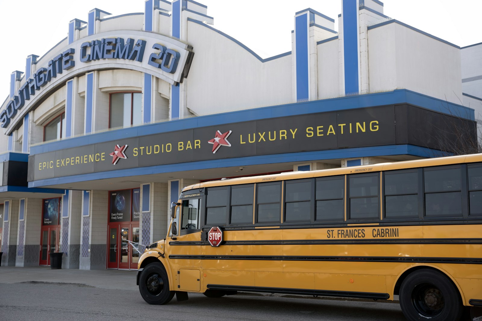 A Cabrini school bus parks outside the MJR Southgate Cinema on March 13. (Gabriella Patti | Detroit Catholic)