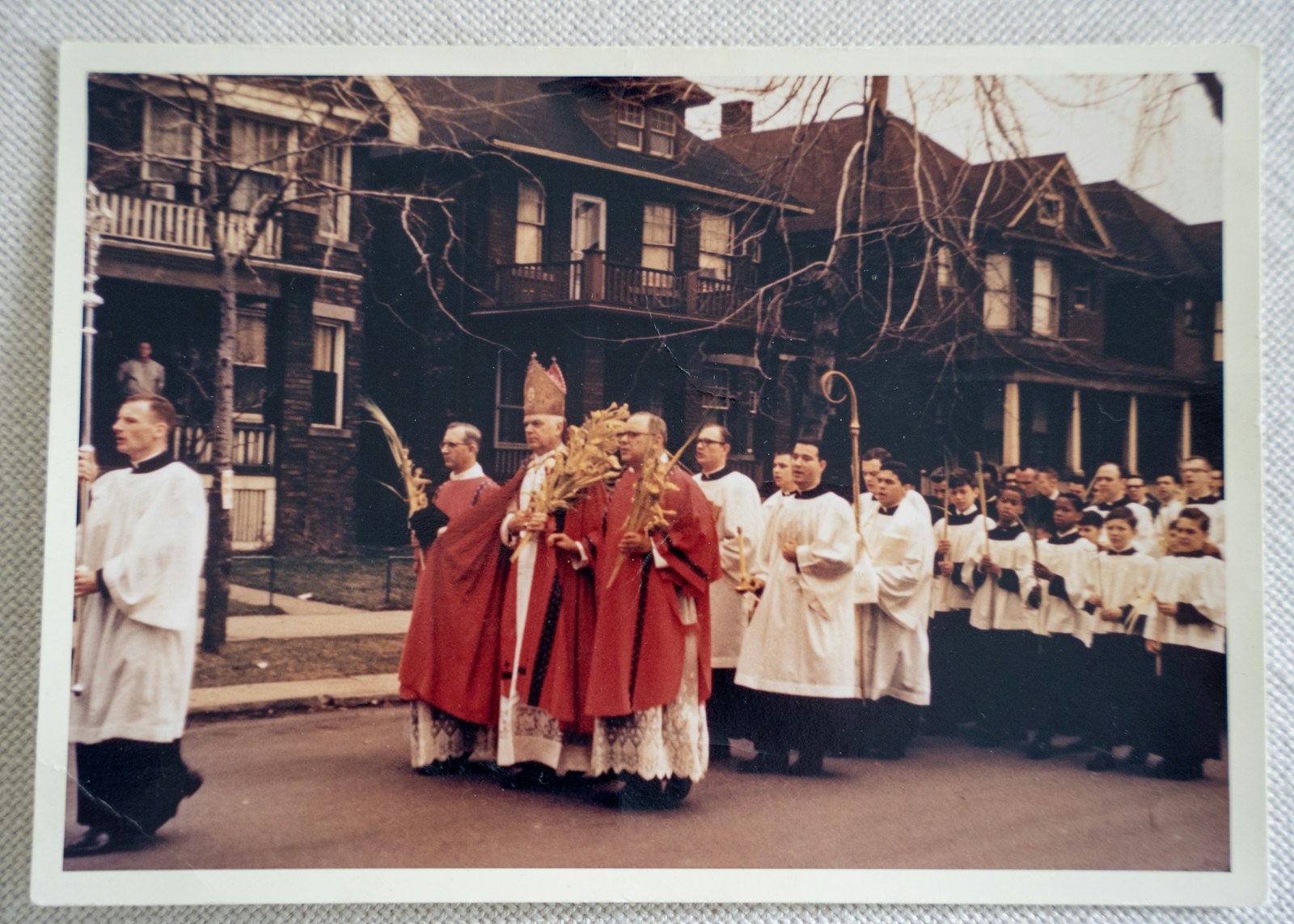 Cardinal John F. Dearden carries a palm frond designed by the Wenson family through the streets of Detroit during a Palm Sunday liturgy in this file photo.