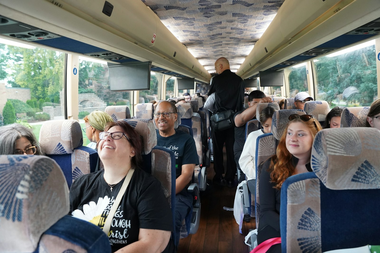 A bus full a youths and chaperones gets set to depart from the Church of the Divine Child in Dearborn on July 17. Divine Child has been hosting Eucharistic adoration and seminars on different parts of the Mass in the buildup to the National Eucharistic Congress.