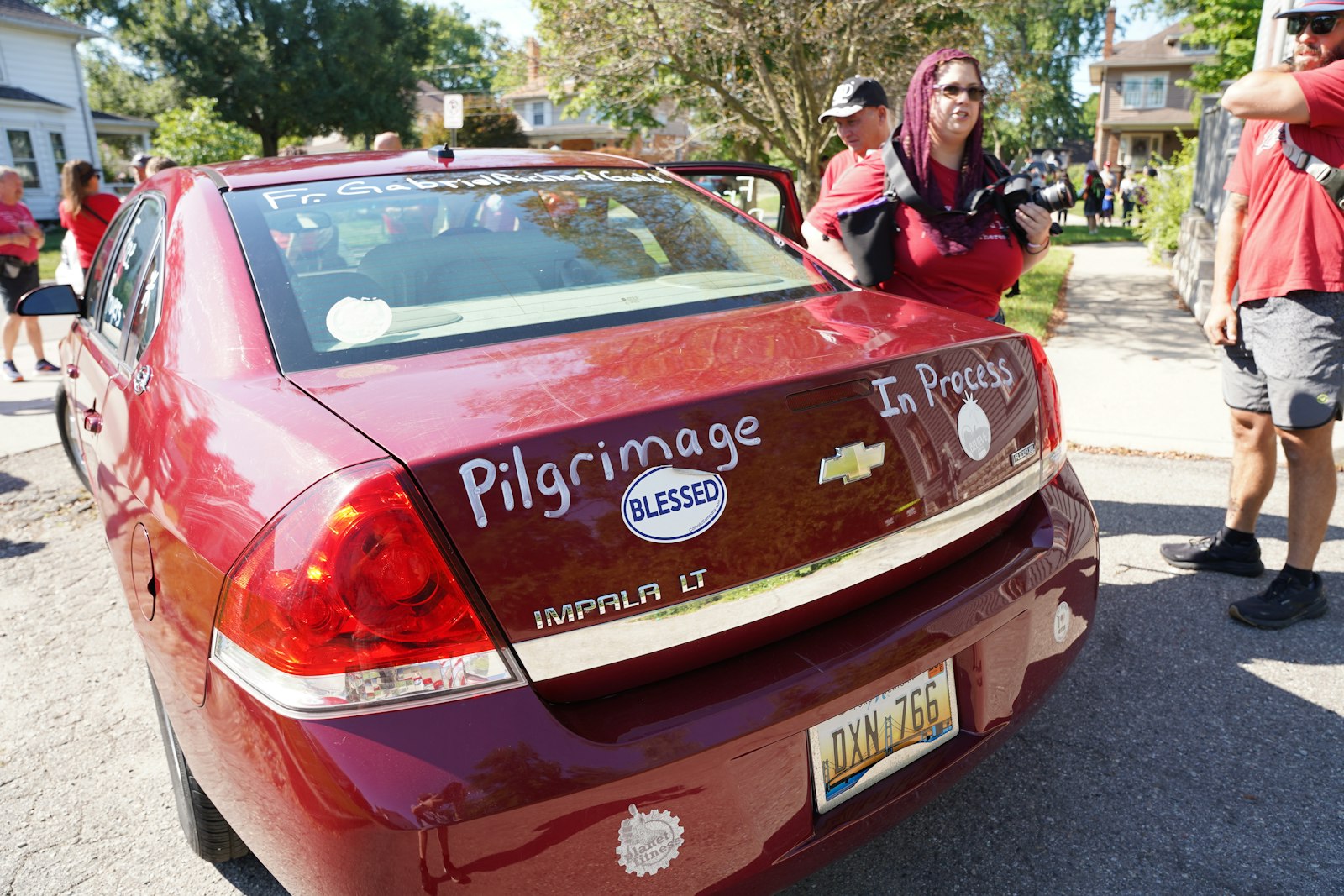 "Powered by prayer," the "Rise from the Ashes" pilgrimage features a support car that carries water and snacks, along with being on standby for any pilgrim who needs a break from walking in the summer heat.