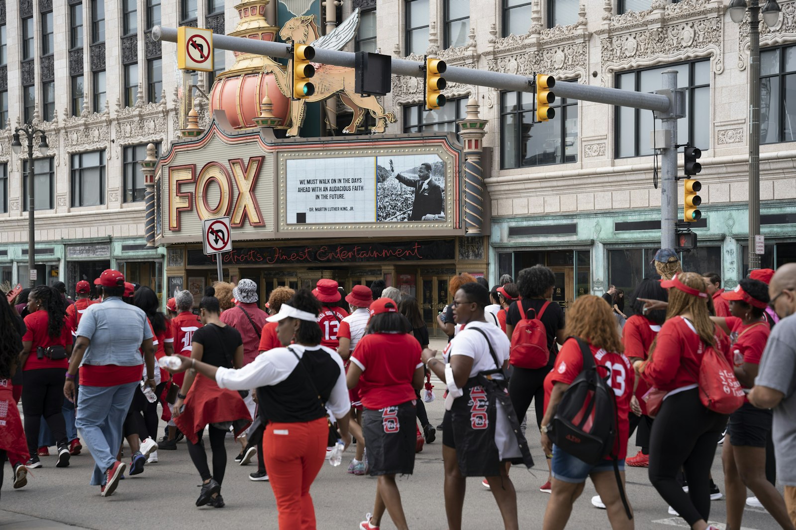 Detroiters march past the Fox Theatre on Woodward Avenue on their way to Hart Plaza in downtown Detroit to mark the 60th anniversary of the Rev. Martin Luther King Jr.'s famous "I Have a Dream" speech, which he first delivered in Detroit in 1963.