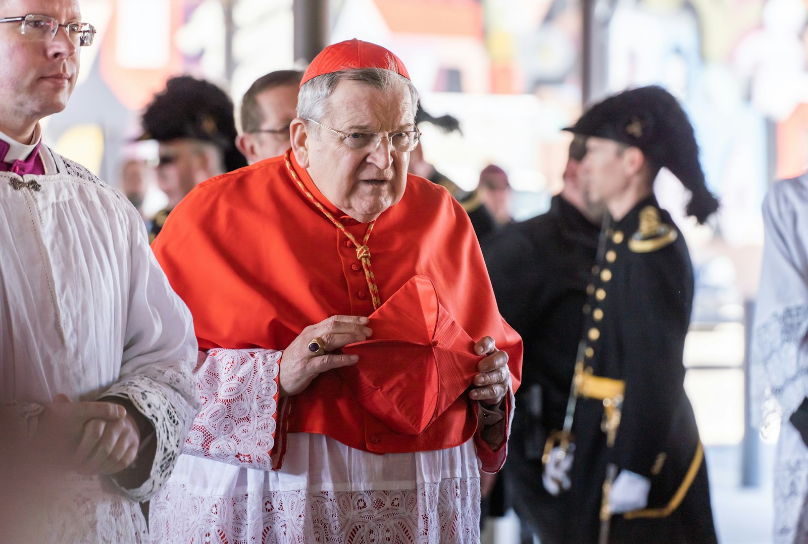 Cardinal Raymond Burke, former archbishop of St. Louis and former prefect of the Apostolic Signatura, the Vatican's highest court, participates in a procession with a statue of St. Joseph on March 20, the feast of St. Joseph, outside St. Joseph Shrine near Detroit's Eastern Market.