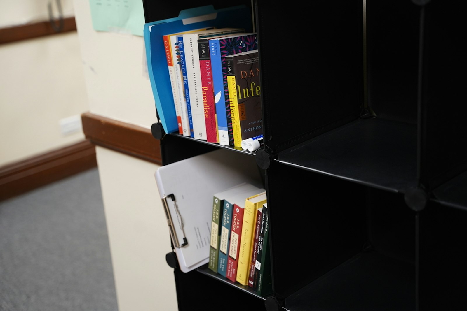 A few of the books on the seminarians' reading list sit on a shelf in a common area of the new propaedeutic wing.