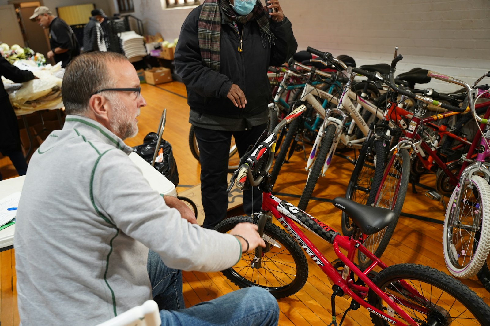 Jack Lintol serves on the board of directors at Matchan and has been in charge of its bike ministry. He organizes the collection, restoration and distribution of donated bicycles. Lintol said people's faces light up when they are given a bike.