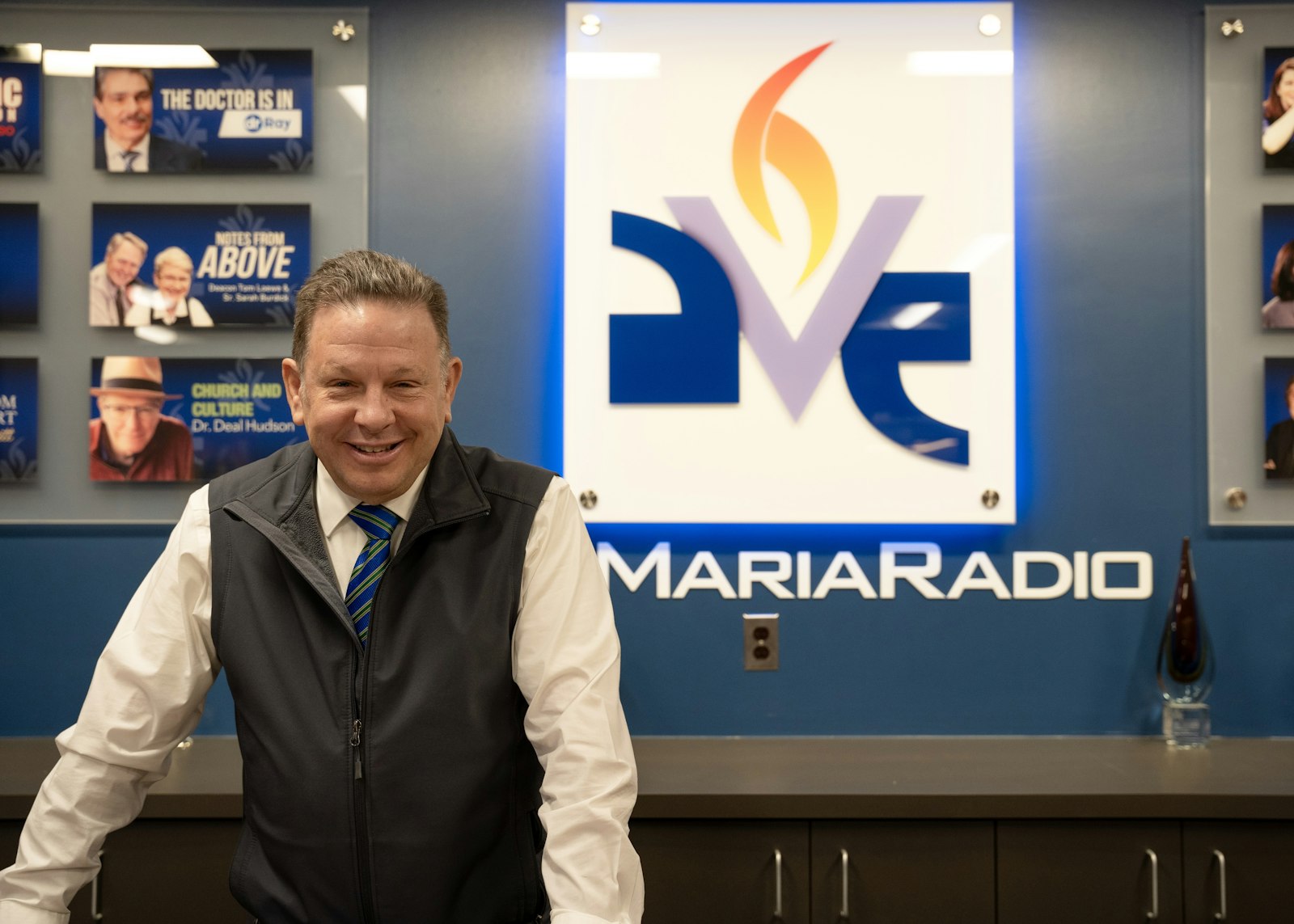 New station president Mike Jones smiles as he poses for a photo inside Ave Maria Radio's studios. "Ave Maria in the Afternoon" joins a program lineup that includes other popular programs such as "Catholic Connection" with Teresa Tomeo, "More 2 Life" with Dr. Greg and Lisa Popcak, and "Epiphany" with Vanessa Denha Garmo.