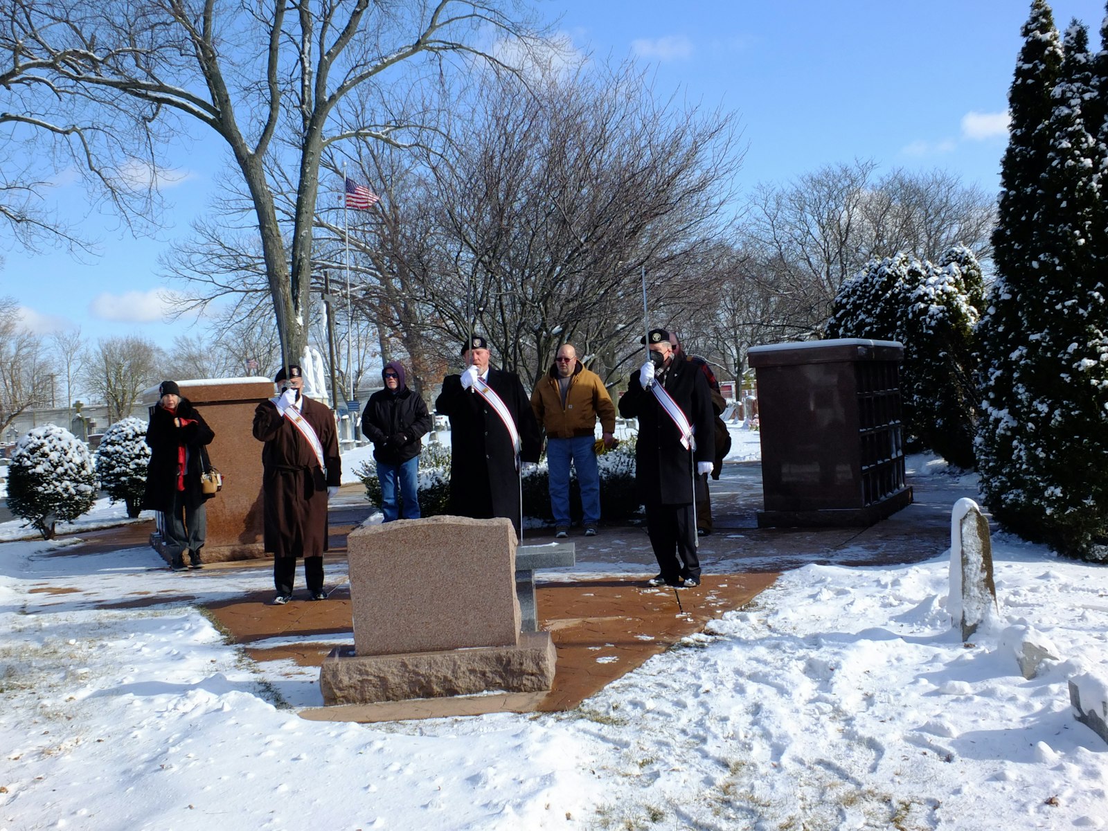 Marchers pray at the memorial monument for the unborn at Mt. Carmel Cemetery in Wyandotte.