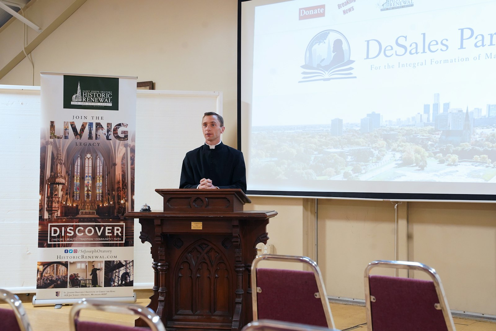 Canon Commins introduces DeSales Park at a press conference at the St. Joseph Shrine social hall on Nov. 19. An anonymous donor made a major donation for the institute to purchase the property for $2.75 million. (Photo by Daniel Meloy | Detroit Catholic)