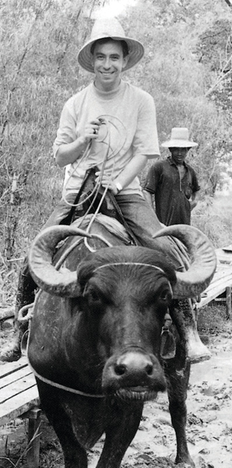 American PIME missionary Fr. Dennis Koltz rides a yak in his mission in Brazil in this undated photo.